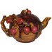 Majolica-like Teapot Draped with Red Fruit
